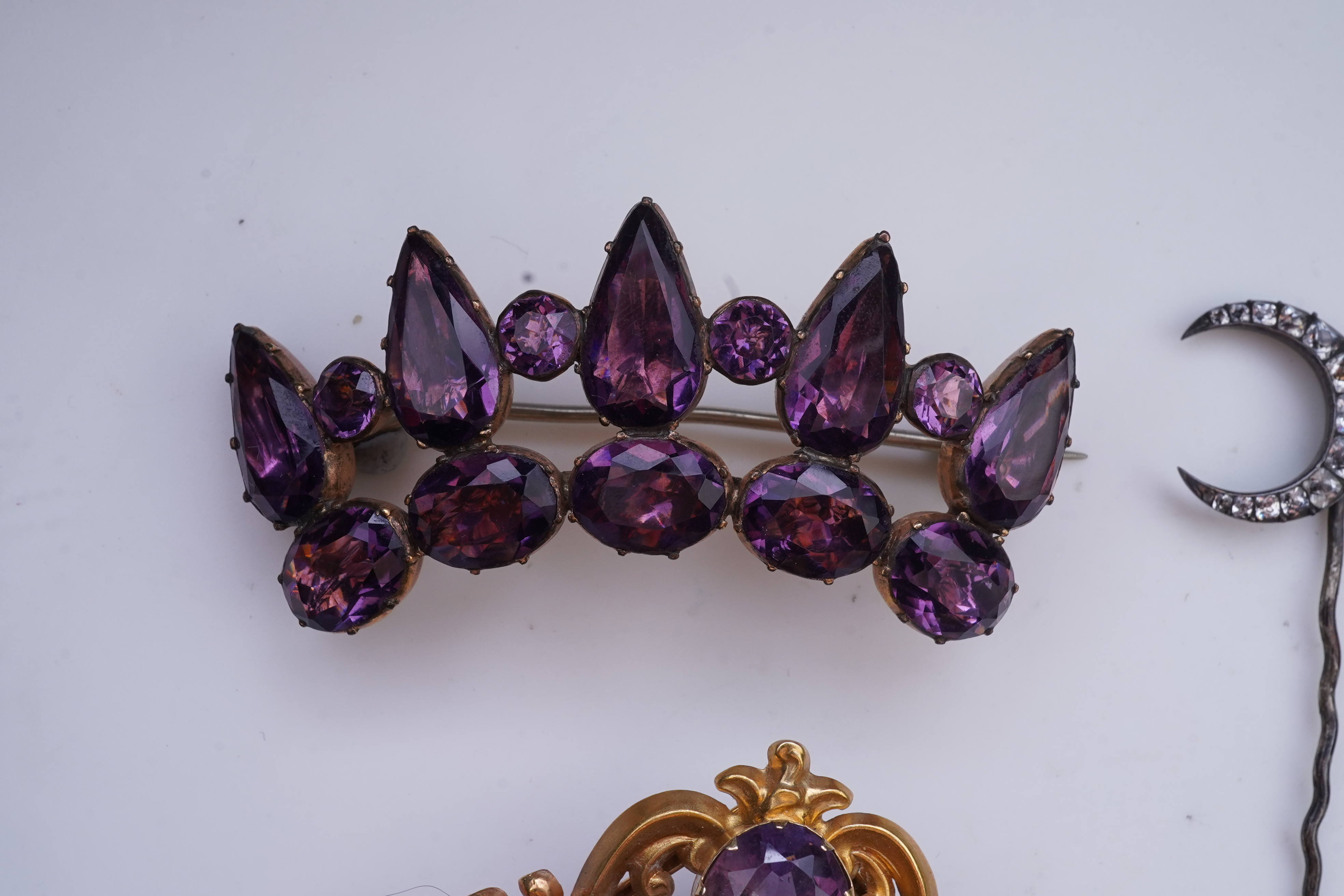 A collection of jewels including a Georgian paste brooch, early 19th century